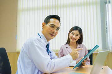 doctor man look forward while explain health care result to patient woman