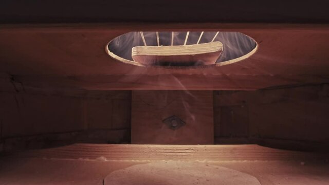 View from inside of guitar player. Guitarist playing the guitar. 