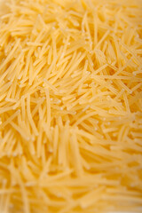 Top view of raw vermicelli pasta as an original background