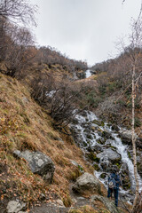 travel, walk, autumn, october, cloudy day, nature, landscape, mountain gorge, valley, mountains, snowy peaks, vegetation, trees, rocks, fog, waterfall, streams, water