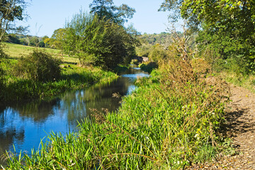 Bright autumn morning on the Cromford canal following the Derwent Valley Heritage Trail