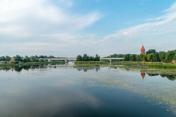 Nogat river with railway bridge in Malbork.