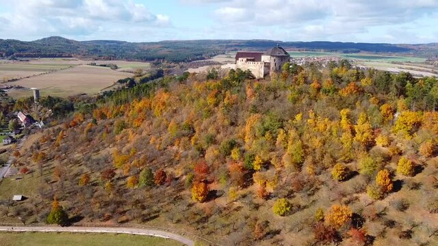Aerial view of czech castle Tocnik in autumn time in Czech republic