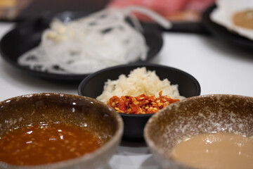 Selective focus in chopped chili and chopped garlic.