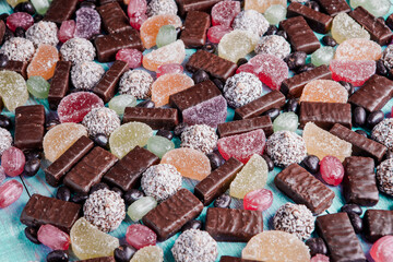 Assortment of delicious chocolate candies background. Chocolate candy isolated 