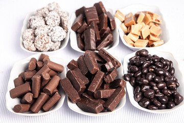 Assortment of delicious chocolate candies background. Chocolate candy isolated 