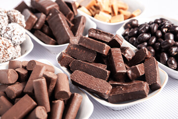 Assortment of delicious chocolate candies background. Chocolate candy isolated 