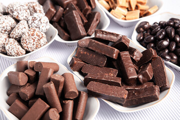 Assortment of delicious chocolate candies background. Chocolate candy isolated 