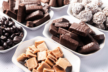Assortment of delicious chocolate candies background. Chocolate candy isolated 