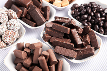 Assortment of delicious chocolate candies background. Chocolate candy isolated 