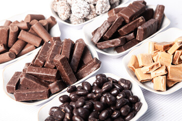 Assortment of delicious chocolate candies background. Chocolate candy isolated 