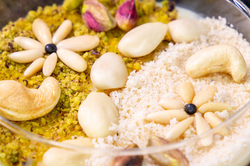 Fototapeta na wymiar Zgougou Tunisienne cashew desert photography - healthy breakfast cereal yogurt and fruits