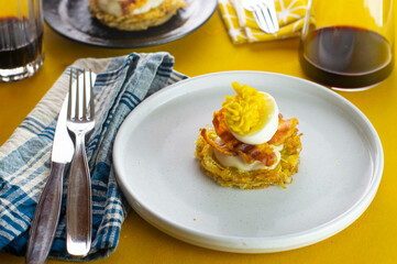 Rosti, bacon and hard boiled egg for breakfast