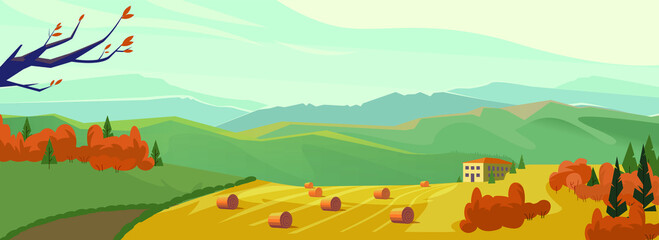 Golden field with round hay bales against the mountains and a picturesque cloudy sky on a perfect autumn day. Haystack on the meadow in autumn.  