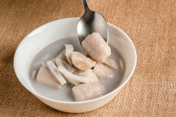 Boiled banana in coconut milk, Thai dessert. Banana in coconut milk. Asian tradition culture dessert. Fruit dessert. Traditional dessert of Asian