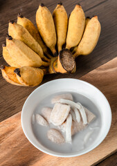 Boiled banana in coconut milk, Thai dessert. Banana in coconut milk. Asian tradition culture dessert. Fruit dessert. Traditional dessert of Asian