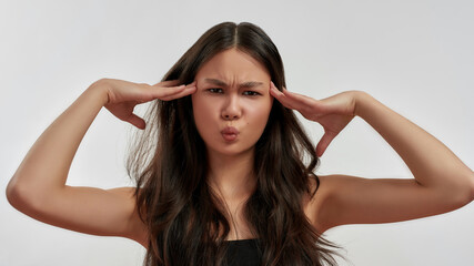 Fototapeta premium Portrait of unhappy Asian woman feel dissatisfied