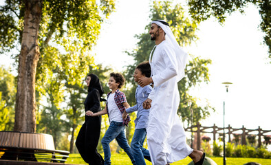 Cinematic image of a family playing at the playground