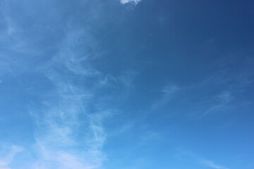 beautiful blue sky with white soft clouds