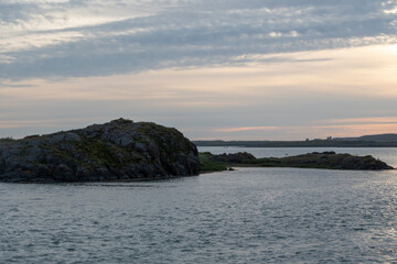 Landscape of bridge cliffs and mountains at sunset in Borgarnes Iceland