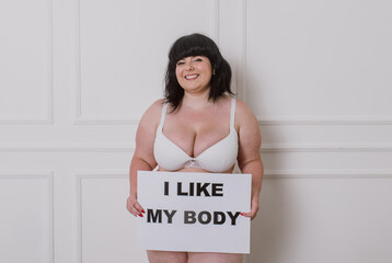 Curvy women posing in studio for a body positive photosession