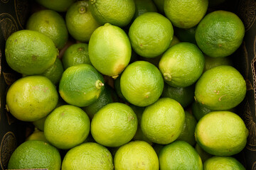 lime background. Citrus fruit. Natural remedy for colds. Vegetarian food. Green background. 