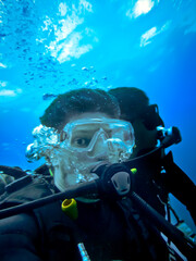 scuba diver at Ressureta diving point in Fernando de Noronha archipelago, State of Pernambuco,...