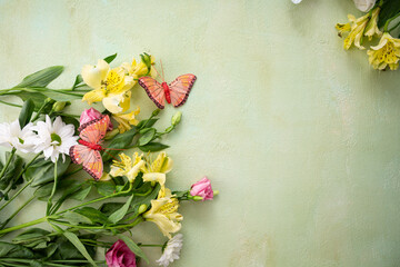 Summer background with flowers and copy space green surface