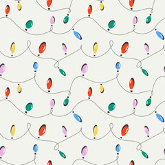 Christmas lights on a light background. Seamless pattern. 