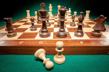 Wooden chess with white and black chess pieces
