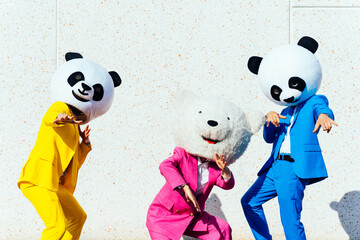 Fototapety  Storytelling image of a couple wearing giant panda head