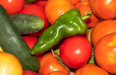 Fototapeta na wymiar Close up of homemade tomatoes, cucumbers and peppers