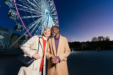 Storytelling image of a multiethnic senior couple in love