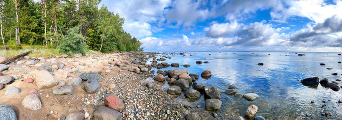 The unusual landscape of Kaltene beach on Baltic sea shore is formed by large boulders that cover...
