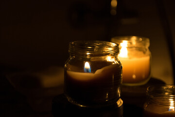 The romantic candlelight from darkness