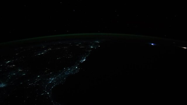 Spectacular night view of planet earth from space, time lapse of planet rotating from orbit with night lights. Images furnished by Nasa
