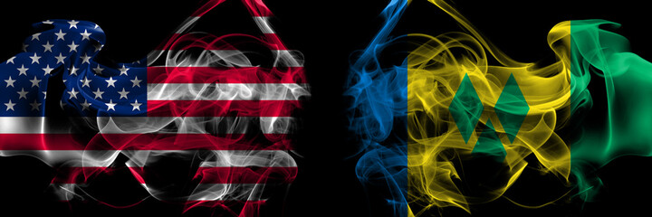 Obraz premium United States of America vs Saint Vincent and the Grenadines smoke flags placed side by side