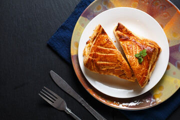 Food concept French Meat puff pie on black background with copy space