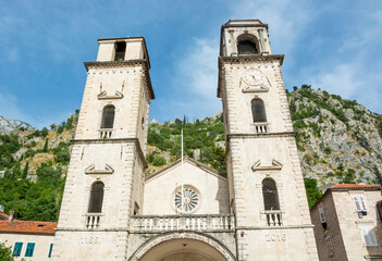 Fototapeta na wymiar The Clock Tower at the Armory Square in the old quarter of Kotor i