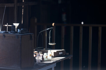 Measuring devices on a dusty table in an old mining building