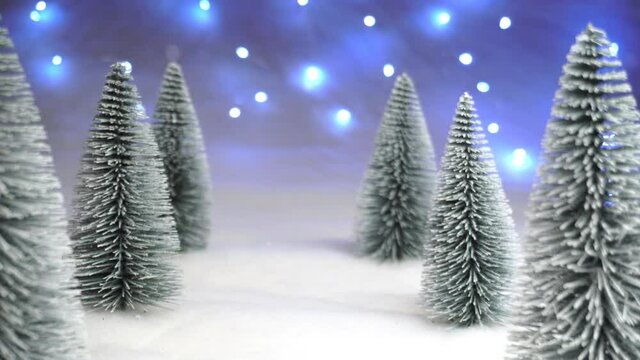 Christmas background snowfall, tree, camera motion