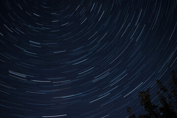 Star Trails on a clear night make a circular pattern in the sky