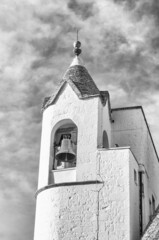 Belltower of the Trullo church in Alberobello, Italy