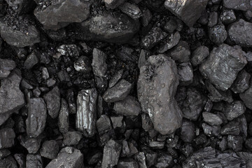 Black coal background. Mineral, fuel for heating residential buildings
