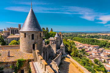 Panoramic View of medieval citadel Carcassonne from the castle walls of Carcassonne town. Ancient historical monuments of Europe on the South of France.