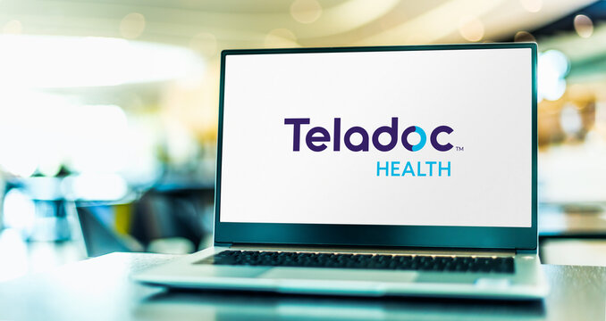Laptop computer displaying logo of Teladoc Health