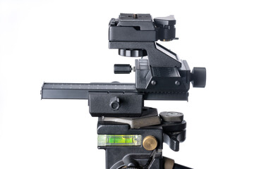 Aluminum 4-way macro photography focus slider mounted on a tripod isolated on white
