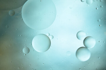 Oil circles on a colored abstract background.