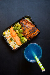 Rice, chicken and vegetables in a box