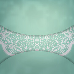 A mint colored greeting card with antique white ornaments prepared for typography.